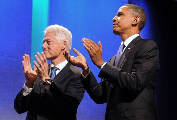 Former US President Bill Clinton (L) and US President Barack Obama (R) welcome US First Lady Michelle Obama (not pictured) at the Clinton Global Initiative (CGI) in New York, New York, USA, 23 September 2010. President Obama joined sixty-four current and former heads of state in attending the sixth annual meeting of the CGI. The commitment of CGI members has improved the lives of more than 220 million people in 170 countries, according to President Bill Clinton. The 2010 meeting features a session on Peace and Beyond in the Middle East.  NYK20100923405