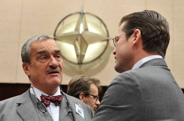 BRUSSELS, Oct. 14, 2010 (Xinhua) -- Czech Foreign Minister Karel Schwarzenberg (L) talks with German Defence Minister Karl-Theodor zu Guttenberg during the NATO s joint Defence and Foreign Ministers Meeting in NATO s headquarters in Brussels, capital of Belgium on Oct. 14, 2010. (Xinhua Wu Wei)(djj) BELGIUM-BRUSSELS-NATO 