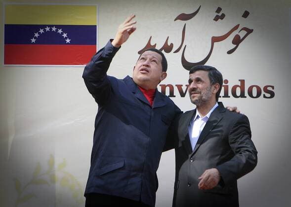 (101020) -- TEHRAN, Oct. 20, 2010 (Xinhua) -- Venezuela s President Hugo Chavez (R) gestures, as he meets with Iran s President Mahmoud Ahmadinejad during a welcoming ceremony in Iran s presidential mansion in Tehran, capital of Iran, Oct. 19, 2010. (Xinhua Ahmad Halabisaz) IRAN-VENEZUELA-MAHMOUD AHMADINEJAD-CHAVEZ-WELCOME CEREMONY 