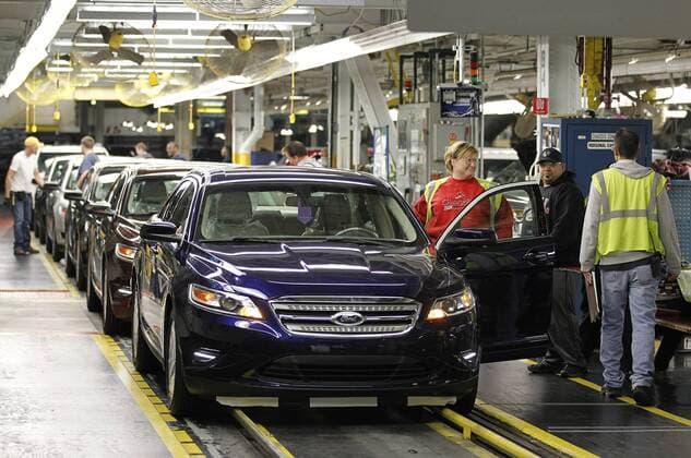 Workers assemble Ford Explorers and Tauruses and Lincoln MKZs at Ford s Chicago Assembly Plant on December 1, 2010 in Chicago. Ford spent nearly Dollar 400 million to renovate its Chicago facility to produce the all-new 2011 Explorer along with the Taurus and MKZ.  CHI2010120114