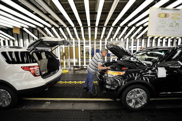 A worker inspects a Ford Explorer as it rolls off the line at Ford s Chicago Assembly Plant on December 1, 2010 in Chicago. Ford spent nearly Dollar 400 million to renovate its Chicago facility to produce the all-new 2011 Explorer along with the Ford Taurus and Lincoln MKZ.  CHI2010120111