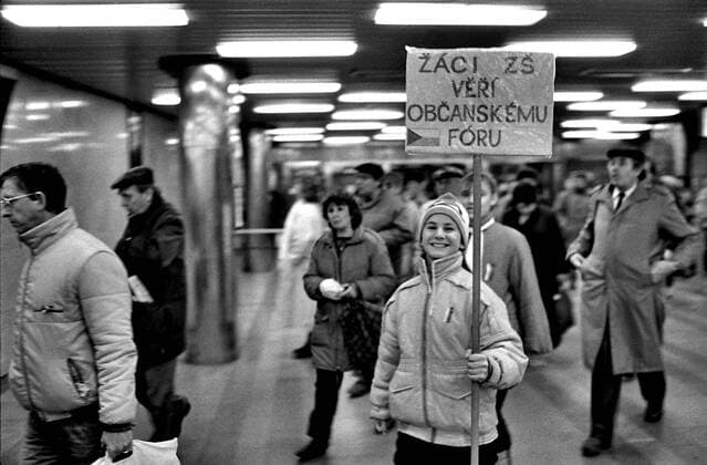 A girl carries poster Elementary school pupils trust the Civic Forum in a metro station in Prague during the Velvet Revolution on November 27, 1989. CTK Photo Jaromir Cejka  CTKPhoto200910301219801