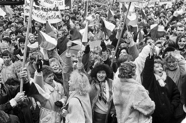 A brutal police action against peaceful march of students in Prague on November 17, 1989, sparked the Velvet Revolution, a series of non-violent demonstrations that toppled the authoritarian Communist regime in Czechoslovakia. Citizens wave the national flags during the general strike in Prague on November 27, 1989. CTK Photo Petr Mazanec  CTKPhoto200911251358201