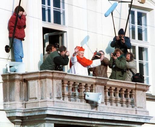 Prague archbishop cardinal Frantisek Tomasek blesses crowds of believers from the balcony of Archbishop Palace at Prague Castle after celebrating a mass on the occasion of canonization of St. Agnes of Bohemia in during Czechoslovakia s Velvet Revolution on November 25, 1989. CTK Photo Karel Mevald  CTKPhoto00231744