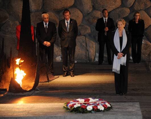 The Foreign Minister of France, Michele Alliot-Marie, pauses for a moment of silence in memory of the victims of the Holocaust in the Hall of Remembrance in the Yad Vashem Holocaust Museum in Jerusalem, Israel, January 20, 2011.  JER2011012010