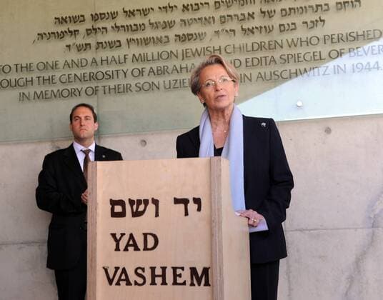 The Foreign Minister of France, Michele Alliot-Marie, signs the guest book outside the Children s Memorial at the Yad Vashem Holocaust Museum in Jerusalem, Israel, January 20, 2011.  JER2011012016