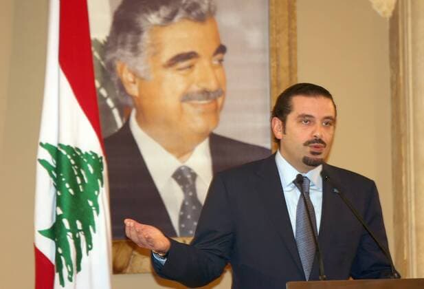 (110120) -- BEIRUT, Jan. 20, 2011 (Xinhua) -- Lebanese Caretaker Prime Minister Saad Hariri speaks in Beirut, Lebanon, Jan. 20, 2011. Hariri said Thursday he will not quit the race to form Lebanon s new cabinet. He said his Future Movement parliamentary block and their Western-backed March 14 Alliance were committed to nominate him in binding consultations to name a new prime minister scheduled to kick off Monday. (Xinhua) (zw) LEBANON-BEIRUT-POLITICS-HARIRI 