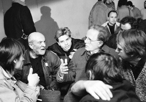 A brutal police action against peaceful march of students in Prague on November 17, 1989, sparked the Velvet Revolution, a series of non-violent demonstrations that toppled the authoritarian Communist regime in Czechoslovakia. Actor and director of the National theatre Miroslav Machacek, second from left, talks to members of student central coordination strike committee in Prague on November 28, 1989. CTK Photo Zuzana Humpalova  CTKPhoto01144516
