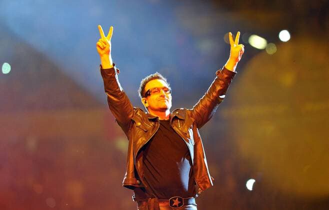 U2 performs in SA JOHANNESBURG, SOUTH AFRICA ? 13 February 2011: U2 lead singer Bono performs in front of a huge crowd at the FNB stadium in Johannesburg, South Africa on 13 February 2011. More than 100 000 people packed the venue to see the legendary band. ( Gallo0000133551