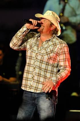 Feb. 21, 2011 - Arlington, Texas, USA - February 19, 2011: Country music singer Toby Keith performs before the PBR Dickies Iron Cowboy Invitational II presented by WinStar World Casino at Cowboys Stadium in Arlington,TX. Arlington USA - ZUMAx65