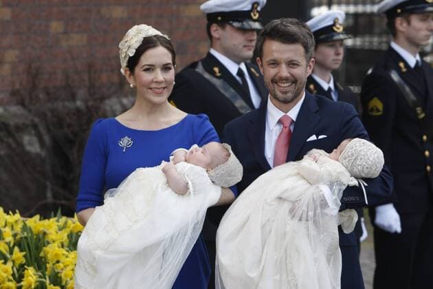(110414) -- COPENHAGEN, April 14, 2011 (Xinhua) -- Crown Prince Frederik of Denmark and his wife Crown Princess Mary greet guests and the media at the baptism of their twin children, Vincent and Josephine, in front of the 16th-century Holmens Church in the Danish capital Copenhagen on April 14, 2011. (Xinhua Devapriyo Das) DENMARK-PRINCE FREDERIK-TWIN BABIES-BAPTISM 