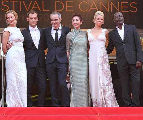 (From L to R) Jury members Uma Thurman, Jude Law, Olivier Assayas, Nansun Shi, Linn Ullmann and Mahamat-Saleh Haroun arrive on the red carpet before the screening of the film Pirates Of The Caribbean: On Stranger Tides during the 64th annual Cannes International Film Festival in Cannes, France on May 14, 2011.  CAN20110514754