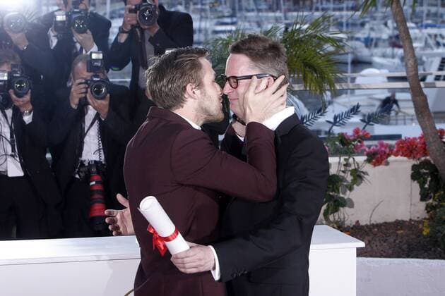 Cannes, France May 22 2011 - 64th International cannes film festival. Nicolas Winding Refn (R) is congratulated by actor Ryan Gosling during a photocall after being awarded with the Prix de la Mise en Scene (best director) for his film Drive .. 
