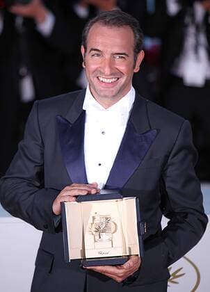 Jean Dujardin arrives at the award photocall after receiving the Best Actor prize for the film The Artist during the 64th annual Cannes International Film Festival in Cannes, France on May 22, 2011.  CAN20110522749