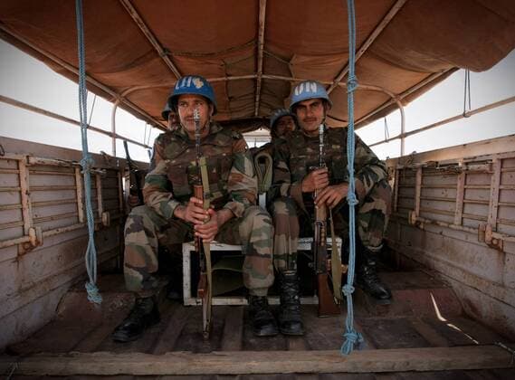 (110525) - ABYEI(SUDAN), May 25, 2011 (Xinhua) - The photo taken on May 24, 2011, and released by the United Nations Mission in Sudan (UNMIS) on May 25, 2011, shows the arrival of the first of 125 Indian Force Reserve Battalion troops deploying in the town of Abyei to reinforce those already on the ground serving with the international peacekeeping operation. The United Nations Mission in Sudan (UNMIS) on Tuesday said more than 15,000 civilians have fled Abyei to Agok area in south Sudan after the Sudanese Armed Forces (SAF) had controlled Abyei.(Xinhua UNMIS PHOTO Stuart Price) (lhh) SUDAN-ABYEI-CONFLICT 