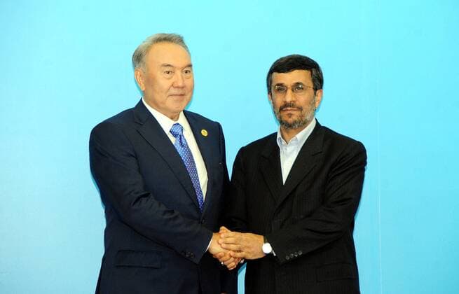 (110615) -- ASTANA, June 15, 2011 (Xinhua) -- Kazakhstan President Nursultan Nazarbayev (L) welcomes Iranian President Mahmoud Ahmadinejad in Astana, capital of Kazakhstan, June 15, 2011. Leaders of the member states of the Shanghai Cooperation Organization (SCO) met in Astana, capital of Kazakhstan, Wednesday to celebrate the 10th birthday of the organization and formulate the SCO s missions for the next decade. (Xinhua Sadat) (zcc) KAZAKHSTAN-ASTANA-SCO SUMMIT 