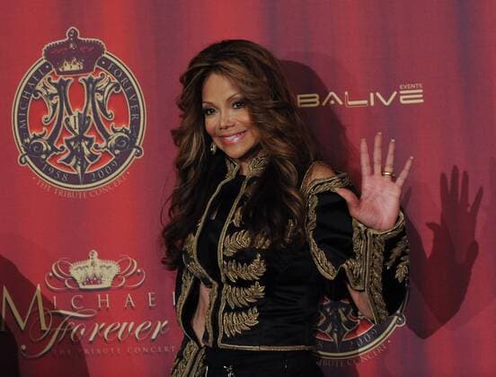 The late pop star Michael Jackson s sister LaToya waves folowing the announcement of a live concert tribute to the King of Pop , during a press conference in Beverly Hills California on July 25, 2011. The concert, which will feature performances by some of the world s leading artists, will be held at the Millennium Stadium in Cardiff, Wales.  LAP2011072533