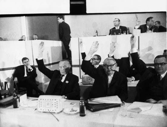 Dr Konrad Adenauer , left , former West German Chancellor and Herr Ludwig Erhard , the present Chancellor , accepting a joint resolution during the closing session of the Christian Democratic Party ( CDU ) Convention in Bonn . 2nd April 1965 Mono Negative !AUFNAHMEDATUM GESCHÄTZT! UnitedArchives1223918