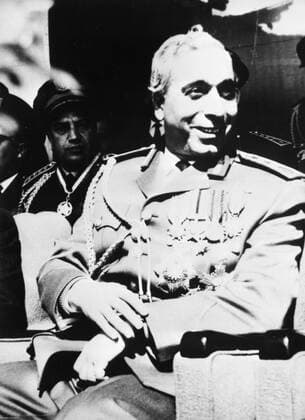Amin Hafez : 1921 - 17 December 2009 , Syrian politician , military officer and a member of the Baath Party , seen here the Syrian President with his medals during ceremonies marking the second anniversary of the Baath Party s rise to power in Damascus , Syria 10 March 1965 Mono Negative UnitedArchives1237139