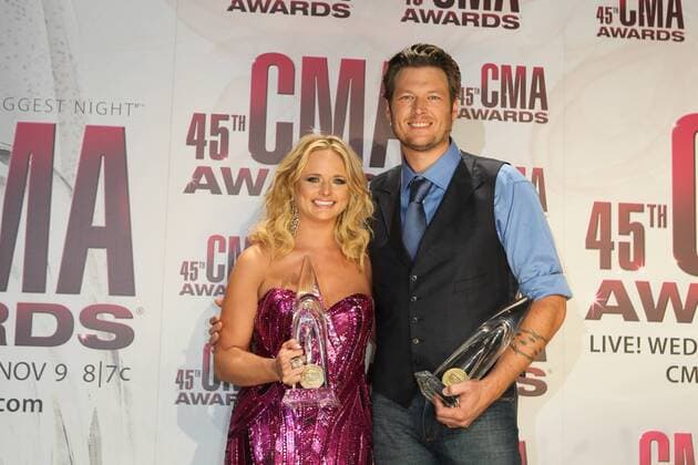 Male Vocalist of the Year Blake Shelton and Female Vocalist of the Year Miranda Lambert pose for photographers back stage at the 45th Annual Country Music Association Awards at the Bridgestone Arena in Nashville, Tennessee on November 9, 2011.  CMA20111009837