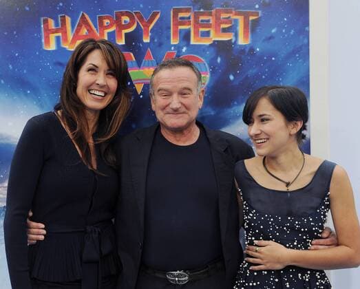 Robin Williams (C), a cast member in the animated motion picture comedy Happy Feet Two , attends the premiere of the film with his wife Susan Schneider (L) and daughter Zelda Williams at Grauman s Chinese Theatre in the Hollywood section of Los Angeles on November 13, 2011.  LAP2011111335
