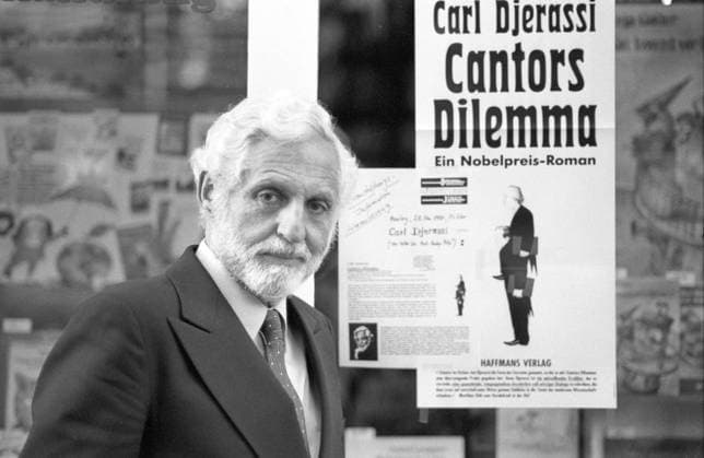 Carl Djerassi (Wissenschaftler) 05 91 Pop Carl Djerassi im Mai 1991 Mann Autor Wissenschaft Pille Anti Baby Verhütung Antibabypille Verhütungsmittel Erfinder Vater scientist author writer grauhaarig weißhaarig Bart seriös Krawatte Sakko Jackett quer halb stehend neutral Plakat Veranstaltungsplakat Cantors Dilemma sw
