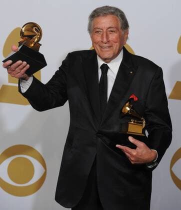 Tony Bennett appears backstage with the Grammy Awards he won for Duets II , Best Traditional Pop Vocal Album and Body and Soul , Best Pop Duo with Amy Winehouse at the 54th annual Grammy Awards at the Staples Center in Los Angeles on February 12, 2012.  LAP20120212252