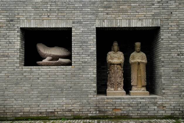 Architektur von Wang Shu (120229) -- BEIJING, Feb. 29, 2012 (Xinhua) -- The photo taken on Feb. 29, 2012 shows partial view of the Ningbo Museum designed by Wang Shu in Ningbo, east China s Zhejiang Province. Chinese architect Wang Shu has won the 2012 Pritzker Architecture Prize, according to a Monday announcement by Thomas J. Pritzker, chairman of the Hyatt Foundation, which sponsors the prize. The 49-year-old Wang was the first architect from the Chinese mainland to win the prize, joining Leoh Ming Pei, a famous Chinese-American architect who won the prize in 1983. The question of the proper relation of present to past is particularly timely, for the recent process of urbanization in China invites debate as to whether architecture should be anchored in tradition or should look only towards the future, said Lord Palumbo, a Pritzker Prize jury chairman, in a statement. As with any great architect 