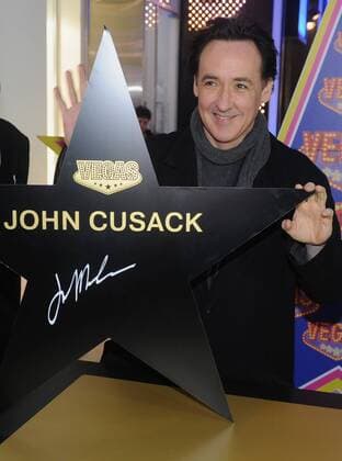 ITAR-TASS: MOSCOW, RUSSIA. MARCH 7, 2012. American actor John Cusack receives a Star on the walk of fame at Moscow s Vegas Shopping and Leisure Centre.  Highlight premiumd RE0F97F2