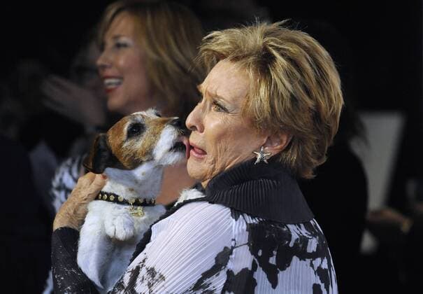Cloris Leachman (R) poses with Uggie at the 26th Genesis Awards held at the Beverly Hilton Hotel in Beverly Hills, California on March 24, 2012.  LAP20120324126