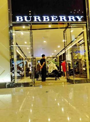 --File--View of a Burberry boutique in Shanghai, China, 30 July 2011. Burberry has been awarded ¡ê63 million ($100 million) in damages after taking a network of Chinese counterfeiters to court. WWD report that the defendants, who ran websites such as yesburberryvision.com and buyburberry.com, were known to have sold at least 22 different product types all bearing imitations of the British heritage brands various trademarks, such as its iconic plaid check and equestrian knight logo. The resolution of the case, which was originally filed in January at Manhattan Federal Court, comes after months of waiting for the defendants to reply to the accusations and appear in court - neither of which was ever done. The domain names for all the infringing sites will now be transferred to Burberry, allowing the brand to cut off any associated internet providers, web designers, sponsored search engin  pau635498_01