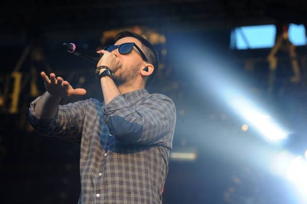 ITAR-TASS: MOSCOW, RUSSIA. JUNE 10, 2012. Mike Shinoda, principal songwriter, keyboardist, vocalist and rhythm guitarist of the rock band Linkin Park, performs at Maxidrom 2012 international rock music festival, at Tushino Airfield.  Highlight RE100C1C