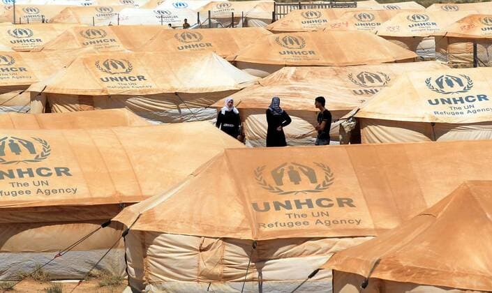 (120807) -- MAFRAQ, Aug. 7, 2012 (Xinhua) -- Syrian refugees are seen at the Al Zaatri refugee camp in the Jordanian city of Mafraq, near the border with Syria, on Aug. 6, 2012. The camp is one of many set up along the border between Jordan and Syria under the management of the United Nations High Commissioner for Refugees (UNHCR) and with the help of local charity groups. (Xinhua Mohammad Abu Ghosh) (dtf) JORDAN-SYRIA-AL ZAATRI REFUGEE CAMP 
