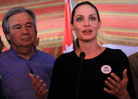 (120911) -- MAFRAQ, Sept. 11, 2012 (Xinhua) -- The U.N. refugee agency s special envoy, actress Angelina Jolie (R), attends a news conference at Al Zaatri refugee camp, in the Jordanian city of Mafraq, near the border with Syria, September 11, 2012. The refugee camp is hosting Syrian refugees displaced by the conflict. (Xinhua Mohammad Abu Ghosh) (zyw) JORDAN-MAFRAQ-ANGELINA JOLIE-VISIT 