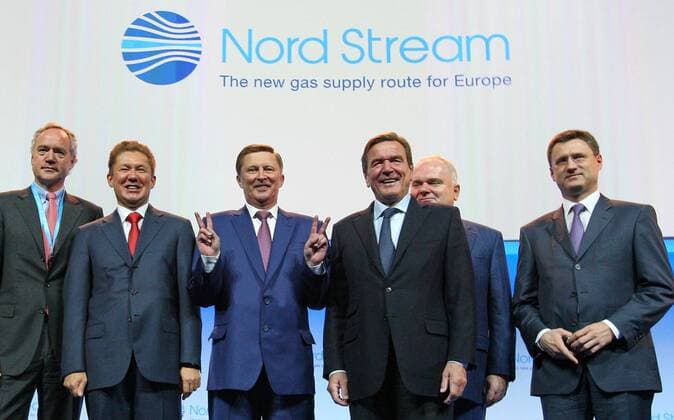 ITAR-TASS: LENINGRAD REGION, RUSSIA. OCTOBER 8, 2012. Russia s energy minister Alexander Novak, Nord Stream AG managing director Matthias Warnig, Nord Stream AG chairman of the board Gerhard Schroeder, Kremlin s chief of staff Sergei Ivanov, and Gazprom CEO Alexei Miller (R-L) at a launching ceremony of the second leg of the Nord Stream offshore gas pipeline at the Portovaya compressor station in Vyborg.  RE10A50A
