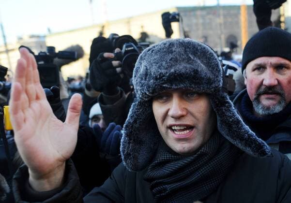 ITAR-TASS: MOSCOW, RUSSIA. DECEMBER 15, 2012. Blogger Alexei Navalny attends an unauthorized Freedom March in Lubyanka Square.  RE1100E4