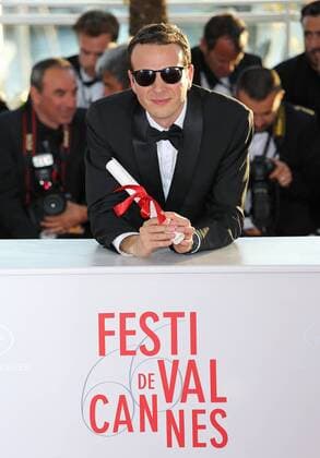 Amat Escalante arrives at the award photocall after receiving the Prix de la mise en scene (Best Director) prize for the film Heli during the 66th annual Cannes International Film Festival in Cannes, France on May 26, 2013.  CAN20130526751