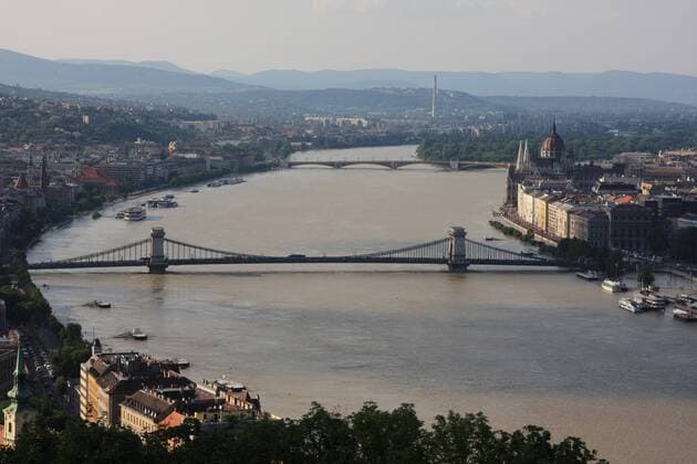 BUDAPEST, June 09, 2013 - The flooding Danube river is seen from Gellert hill in central Budapest, capital of Hungary, June 9, 2013. The water level of the Danube river stood at 8.91 meters in Budapest Sunday night, 0.31 meters more than the record high in 2006.(Xinhua Attila Volgyi) (yc) HUNGARY-BUDAPEST-DANUBE-FLOOD 