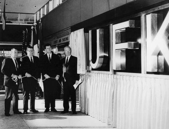 The world s largest airport, known as Idlewild, was renamed John F. Kennedy International Airport a month after the death of President John F. Kennedy - picture shows the official unveiling of the sign which will top the International Arrival Building at the airport - l-r Mayor Robert F. Wagner of New York , Governor Richard J. Hughes of New Jersey , Senator Edward M. Kennedy and Sloan Colt , Chairman of the Port of New York Authority. 27 December 1963. Â UnitedArchives00132646 