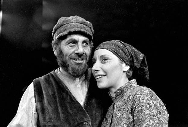 Top Israeli actor Topol and comedienne Miriam Karlin , both in Russian costume , pictured on the stage of Her Majesty s Theatre in London . Both star in a London production of the successful musical Fiddler on the Roof . Topol stars as Tevye , the Milkman , and Miriam , portrays Golde , his wife . The musical is set in Tzarist Russia . 14 February 1967 UnitedArchives00134912 