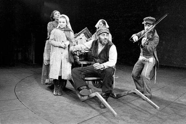 Top Israeli actor Topol and comedienne Miriam Karlin , both in Russian costume , pictured on the stage of Her Majesty s Theatre in London . Both star in a London production of the successful musical Fiddler on the Roof . Topol stars as Tevye , the Milkman , and Miriam , portrays Golde , his wife . Also seen in the picture are Tevye s daughters Diane Robillard (left) as Bielke and Joy Measures as Shprintze and Fiddler played by Peter Ardran . The musical is set in Tzarist Russia . 14 February 1967 UnitedArchives00135004 