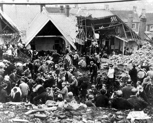 Rescue workers still toil in the black slime 28 hours after it had slipped down the man made mountain of coal waste and engulfed the Pantglas Junior School and some houses of Aberfan, Wales, on Friday 21st October 1966 UnitedArchives00365102 