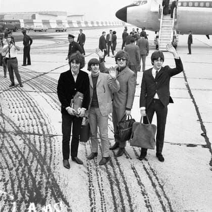The Beatles left to right - Geroge Harrison , Ringo Starr , John Lennon and Paul McCartney , shown as they landed at Kennedy International aiport , New York on 13th August 1965 at the start of their third tour of the United States. UnitedArchives00418045 