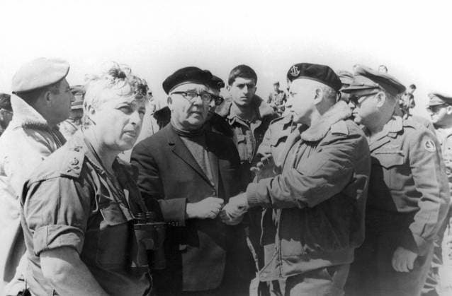 Israeli Prime Minister Levi Eshkol (centre) during his meeting at an Israel command post on the Israel-Jordon border with Chief of Staff, General Haim Bar Lev (second from right) and Commander Ariel Sharon (left), following the dawn attack by Israeli forces on El Fatah bases in Jordan. The one-day attack was launched to Forestall a new wave of terrorism about to be launched against our country. said Levi Eshkol. About 150 arab saboteurs were reported killed. Israeli casualities were put at 15 dead and about 70 wounded. 22nd March 1968 UnitedArchives00474105 