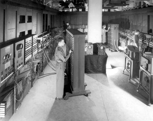An overall view of ENIAC computer showing machine in the process of being prepared to solve a hychodynamical problem UnitedArchives00555695 
