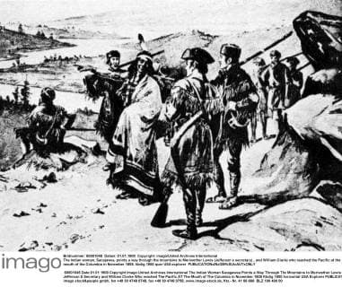 The Indian woman, Sacajawea, points a way through the mountains to Meriwether Lewis (Jefferson s secretary) , and William Clarke who reached the Pacific at the mouth of the Columbia in November 1805. UnitedArchives00563208 