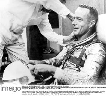 Astronaut Scott Carpenter has his space suit adjusted as he is suited for his orbital flight at Cape Canaveral. Mercuty VII May 1962 UnitedArchives00563554 