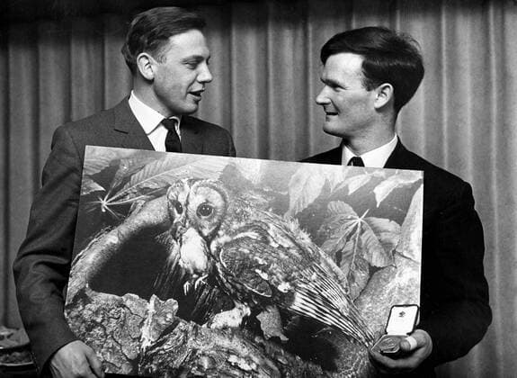 IMAGO ICONS: Sir David Attenborough The picture of a tawny owl bringing food to its young which won the gold medal and title Wildlife Photographer of the Year for Mr CVR Dowdeswell of Radbourne, Leamington Spa. He received his medal from Mr David Attenborough. 4th February 1966. UnitedArchives00563832 