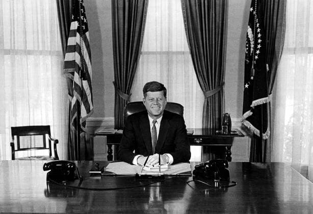 President John Fitzgerald Kennedy sits at his desk in the White House here on January 21st as he starts his first day of work as the thirty-fifth President of the United States of America. At forty-three, President Kennedy is the youngest ever to be elected. In yesterday s inaugural address he told crowds, Let the rest of the world know that this hemisphere intends to remain master in its own house. 21st January 1961 UnitedArchives00565623 