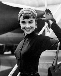 Film actress Audrey Hepburn in turban style hat arrives at London Airport from New York. 21st May 1953 UnitedArchives00596795 